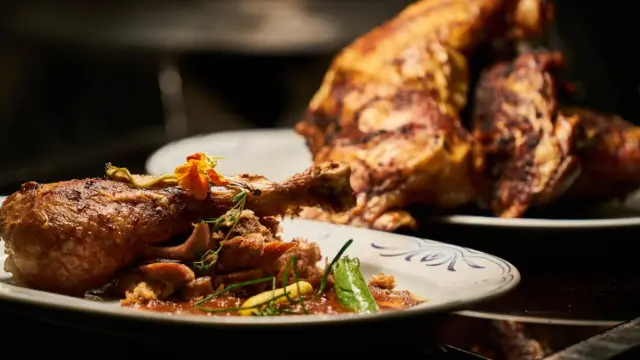 Cooked chicken on a white plate