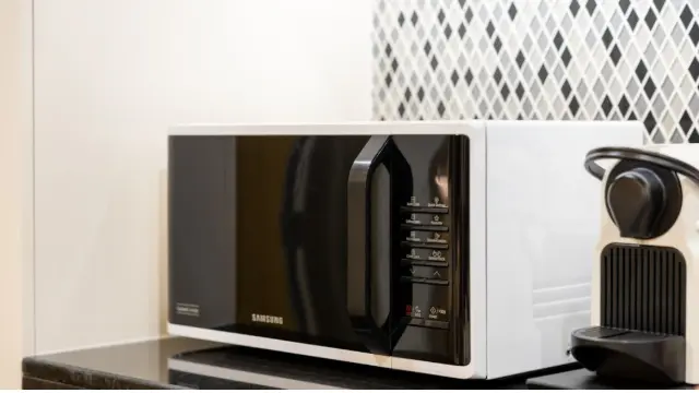 Microwave oven on a kitchen counter