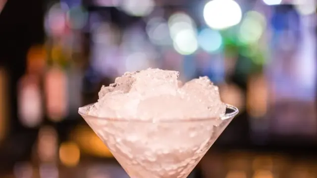 Ice in a cocktail glass