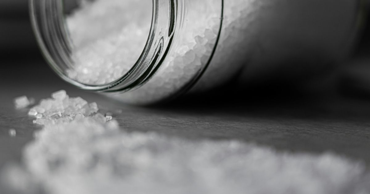 A glass jar filled with salt