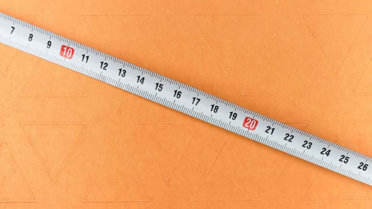 Retractable steel tape measure commonly used in interior design and flooring installation
